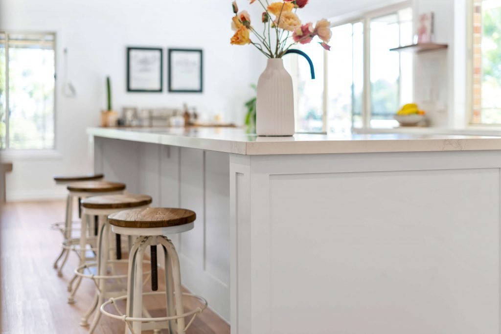island with stools pay off big time in kitchen renovations on the Gold Coast