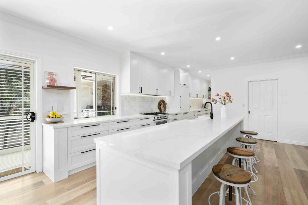 wood marble and white kitchen with elegant bench tops