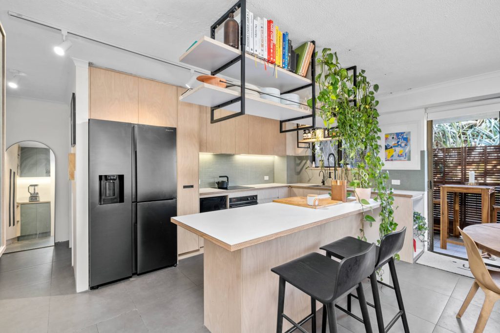 multi-purpose kitchen island with storage and sit up stools